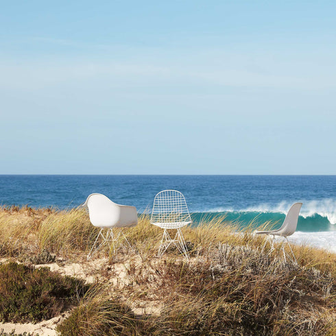 Eames Chair in DSR Plastic / White Base